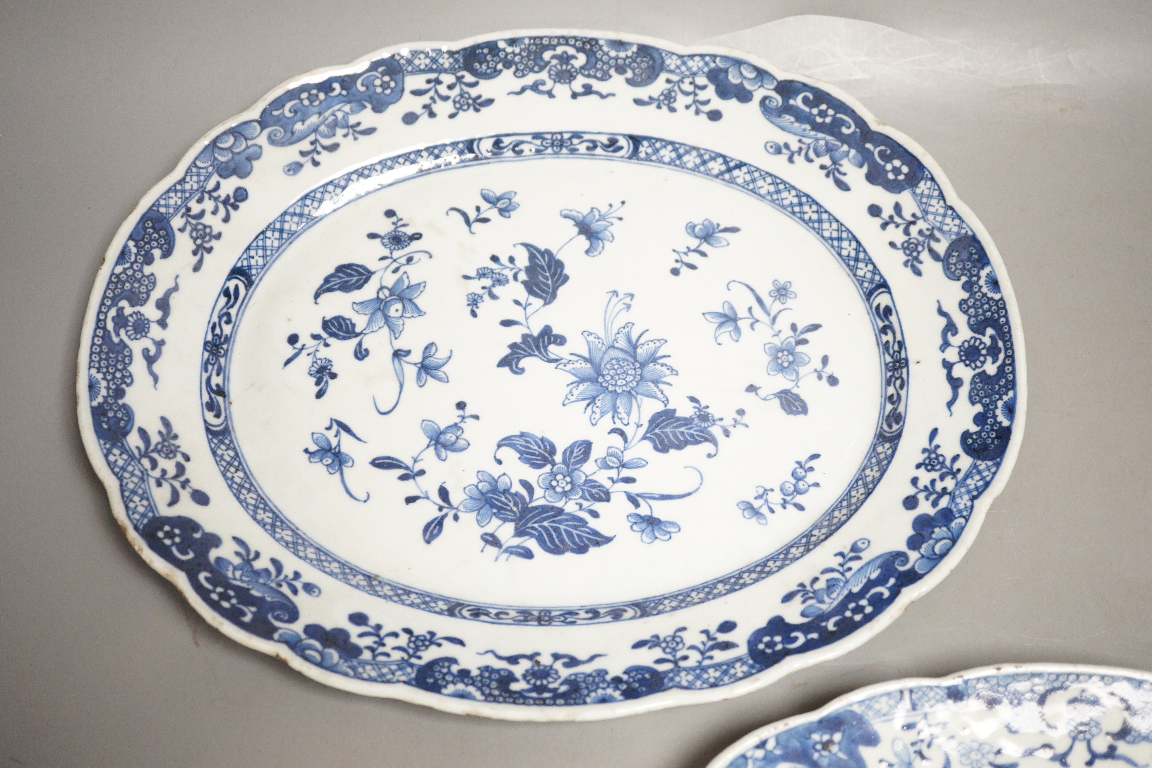 A pair of Chinese blue and white platters, decorated flowers, late 18th century, 34.5cm
